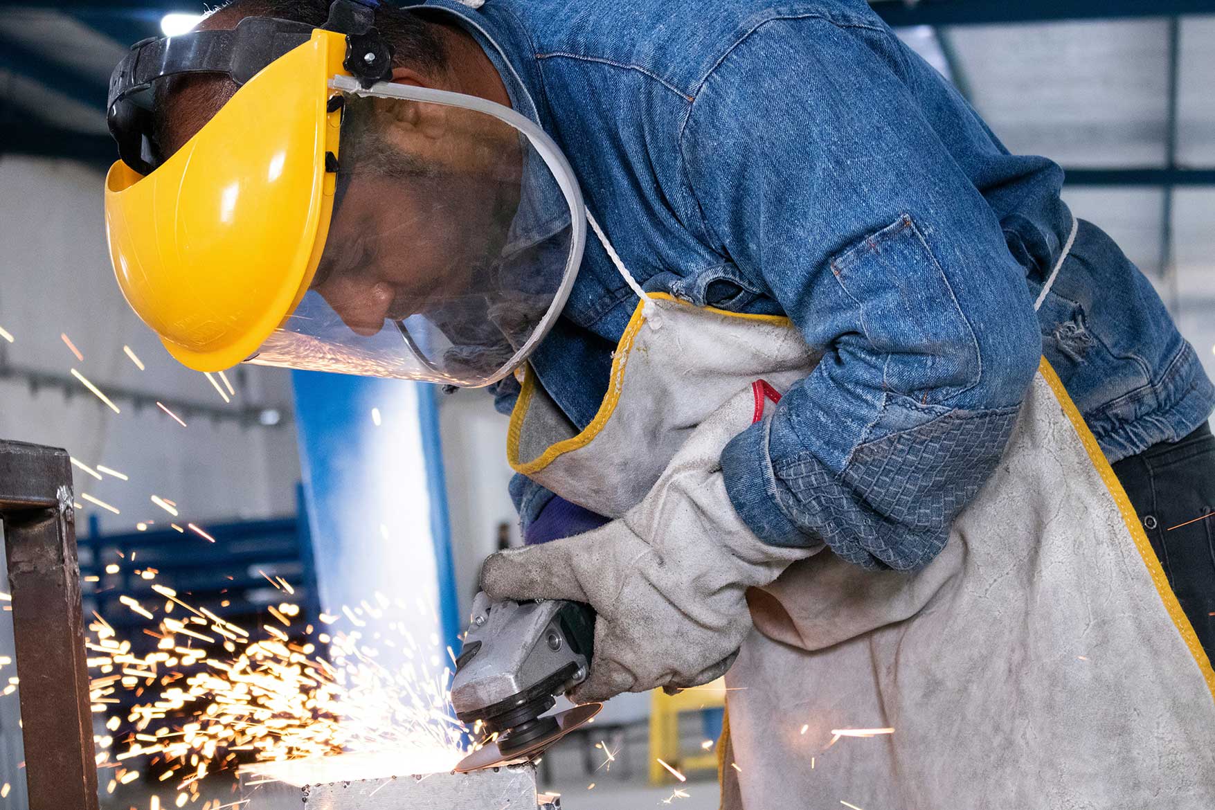 Man working with a grinder